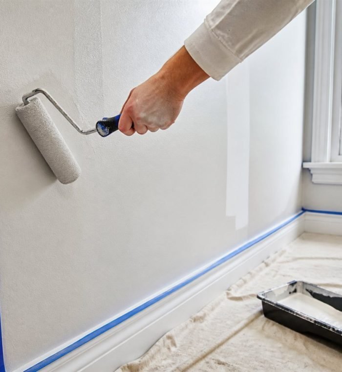 Interior wall being professionally painted during a Sydney home renovation